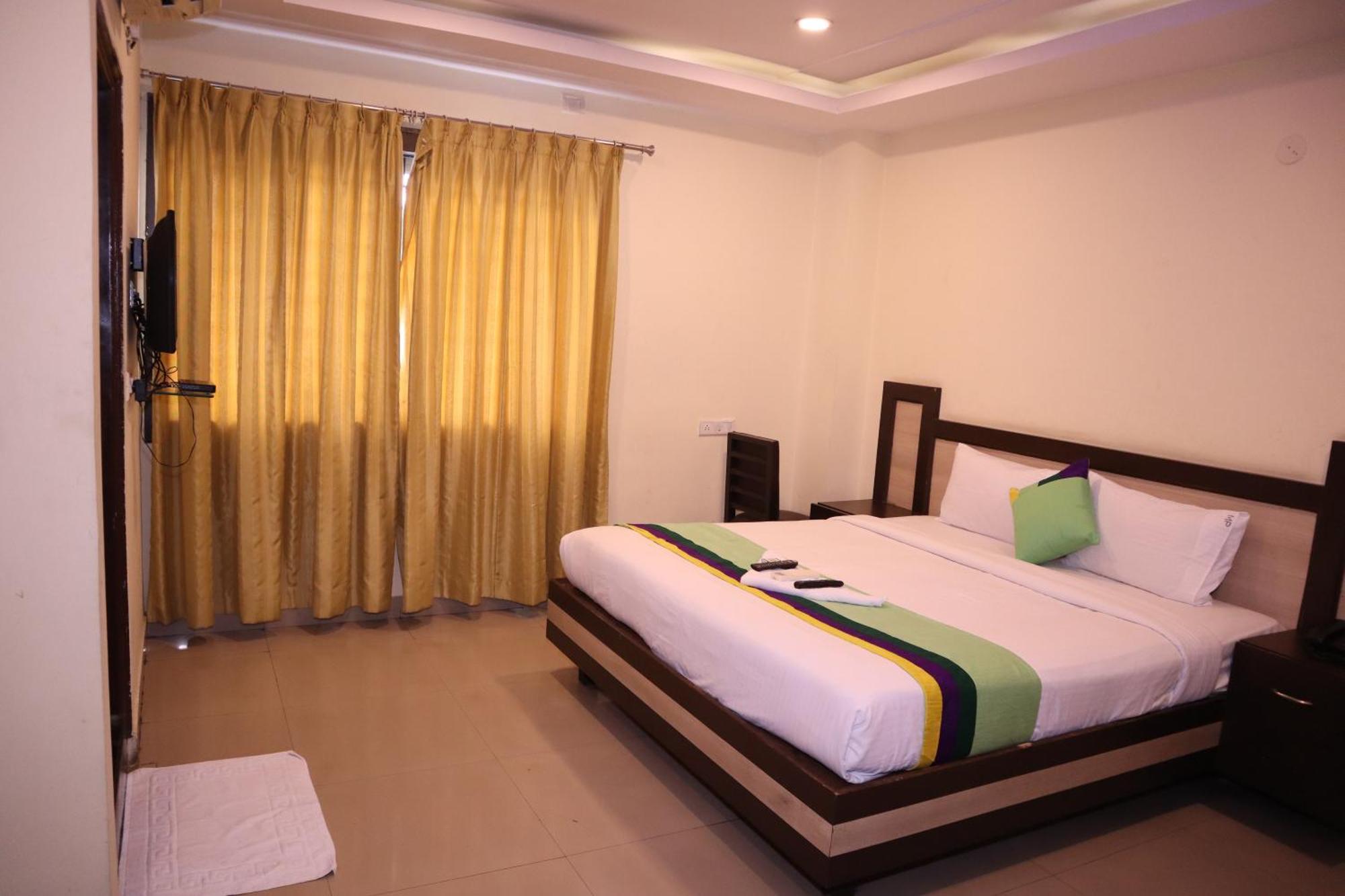 Hotel Millennium Plaza à Kammasandra Extérieur photo
